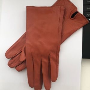Orange genuine leather gloves from Italy